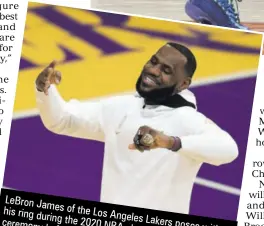  ??  ?? Lebron James of the Los his ring during Angeles ceremony the 2020 Lakers
NBA poses with before their championsh­ip
Los Angeles opening night ring
Los Clippers at game
Angeles, Staples Center against the California. on Tuesday in