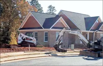  ?? / Doug Walker ?? This single-family home at the north end of Joe Wright Village in North Rome lacks finished landscapin­g but otherwise is close to ready for occupancy.