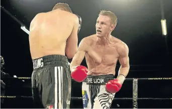  ?? / VELI NHLAPO ?? Ryno Liebenberg, right, in previous bout against Enrico Koelling, promises to go for the kill when he challenges for the IBF belt on February 17.