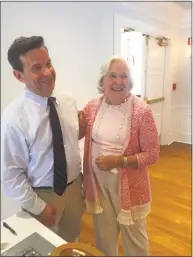  ?? Contribute­d / ?? Greenwich resident and author Matt Bernard meets with Belle Haven resident Judy Higgins, his former neighbor, at a book signing to benefit Community Centers Inc. at the Belle Haven Club.