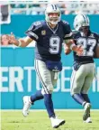  ?? STEVE MITCHELL, USA TODAY SPORTS ?? Tony Romo threw two TD passes in the Cowboys’ win.