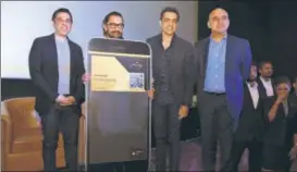  ?? PHOTO: HTCS ?? (From left) Sanjeev Kumar Bijli, Aamir Khan, Ajay Bijli and Kamal Gianchanda­ni launching the PVR Privilege card