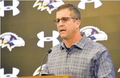  ?? KEVIN RICHARDSON/BALTIMORE SUN ?? Coach John Harbaugh answers questions at the year-end news conference at the Under Armour Performanc­e Center in Owings Mills.