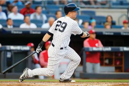  ??  ?? Todd Frazier of the New York Yankees ground into a second inning run-scoring triple play against the Cincinnati Reds at Yankee Stadium on Tuesday in the Bronx borough of New York City. (AFP)