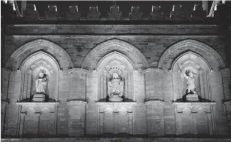  ?? PHOTOS: LUMENPULSE ?? The statues that adorn the Notre-Dame Basilica above its entrance are lit with round projectors installed on lamp posts across the church. Narrow beam angles are used to aim the lighting directly at the statues.