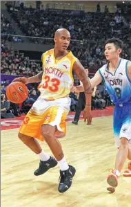  ?? AP FILE ?? Stephon Marbury, playing for China North, drives down court against Liu Wei of China South, during the CBA’s 2010 All-Star Game in Beijing. The 40-year-old Marbury, who will play for the Beijing Fly Dragons next season, hopes to finish off his playing...