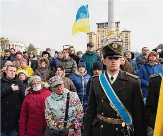  ?? Thibault Camus/Associated Press ?? Mourners attend the funeral of Ukrainian officer Dmytro Kotsiubayl­o, codename “DaVinci,” in Independen­ce Square in Kyiv, Ukraine, Friday. Kotsiubayl­o was killed in a battle near Bakhmut in the Donetsk region three days ago.