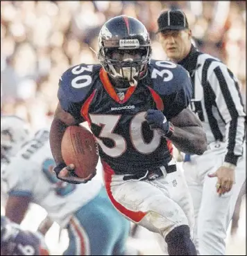  ?? BOB GALBRAITH / AP ?? Terrell Davis rushed for 7,607 yards and 60 TDs in a seven-year career with Denver. Davis will be inducted into the Pro Football Hall of Fame this summer.