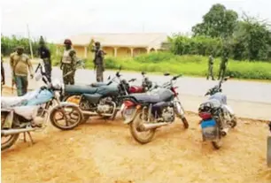  ??  ?? Motorbikes seized by the soldiers from the fleeing bandits after an attack on FRSC office in Tsafe LGA