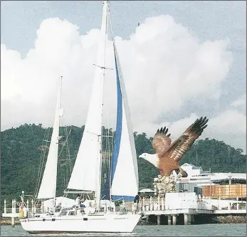  ??  ?? EXOTIC: The Forrester’s yacht, Deusa, at anchor at Hole-in-the-Wall in Malaysia, one of many countries they called on during their life at sea.