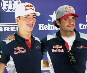  ??  ?? Eager for action: Toro Rosso drivers Pierre Gasly (left) and Carlos Sainz posing for a photograph after a press conference at the Sepang Internatio­nal Circuit yesterday.