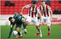  ?? ?? STALEMATE Tavernier battles with Stoke’s Tommy Smith