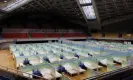  ?? Photograph: Thomas Peter/Reuters ?? Beds are seen in a fever clinic that was set up in a sports area as Covid-19 outbreaks continue in Beijing.