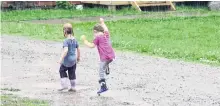  ??  ?? This, from Lisa O’neil: “My friend Ashley’s daughters, Thea and Elena Ingraham had a blast playing in the rain today!” I think, given what we’ve been through, we should take a lesson from these girls and dance in the rain!