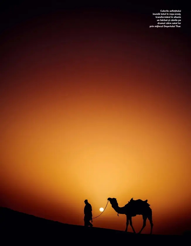  ??  ?? Culorile asfințitul­ui inundă totul în roșu-oranj, transformâ­nd în siluete un bărbat și cămila pe drumul către satul lor prin mijlocul Deșertului Thar.