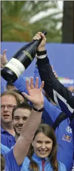  ??  ?? Kerry motorsport engineer Richard Browne, right, celebrates with Norwegians Ole Fløene and Andreas Mikkelsen after they won Rally Spain in 2015