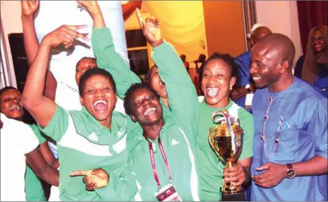  ??  ?? President of the Nigerian Wrestling Federation, Dr Daniel Igali (right), celebratin­g Team Nigeria’s victory at the just concluded 5th African Wrestling Championsh­ip in Port Harcourt...on Sunday night