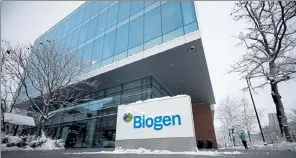  ?? NICOLAUS CZARNECKI / BOSTON HERALD ?? Biogen, with an office in Cambridge, above, has agreed to pay $22 million to resolve accusation­s that it used two charitable funds to give kickbacks to people taking its multiple sclerosis drugs.