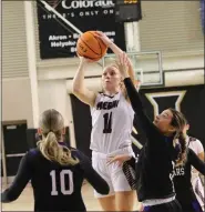  ?? OTSPORTSCH­ECK — COURTESY PHOTO ?? Jade Powell (11) puts up a shot for Merino as the Rams take on Sedgwick County in the NJC Holiday Tournament championsh­ip game.