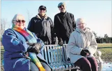  ?? KRIS DUBE THE WELLAND TRIBUNE ?? Karen Zadegan, left, Momtaz Zadegan, John Gardiner, and Ann Wolf from the Spiritual Assembly of the Baha'i at a new garden in Welland.