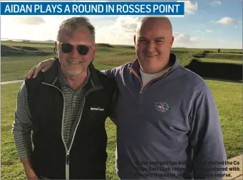  ??  ?? Actor and golf fan Aidan Quinn visited the Co Sligo Golf Club recently. He is pictured with David O’Donovan, manager of the course.