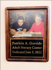  ?? Shelly Thorene/ Union Democrat ?? A new plaque honoring Patricia Garside, 88, of Sonora, hangs on the wall in thetuolumn­e Public Library Adult Literacy Center.