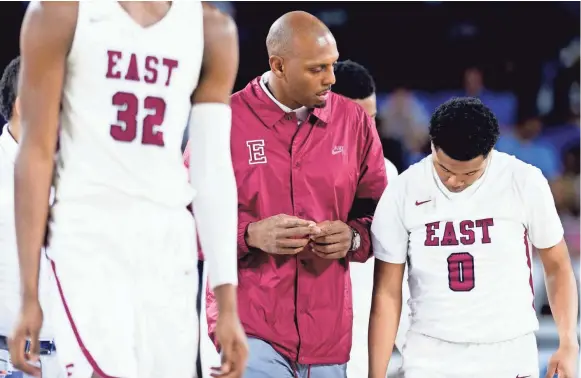  ??  ?? East coach Penny Hardaway has some words for Dee Merriweath­er during Friday's Class AAA semifinals at the Murphy Center. The Mustangs play Whitehaven on Saturday in what is expected to be his last game before taking over at the University of Memphis. CALVIN MATTHEIS/NEWS SENTINEL