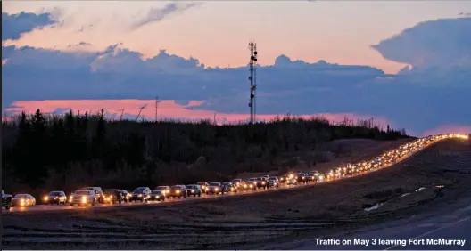  ??  ?? Traffic on May 3 leaving Fort McMurray