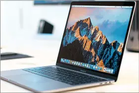  ??  ?? MacBook Pro is available both in a silver finish and Apple’s super-cool space grey colour.