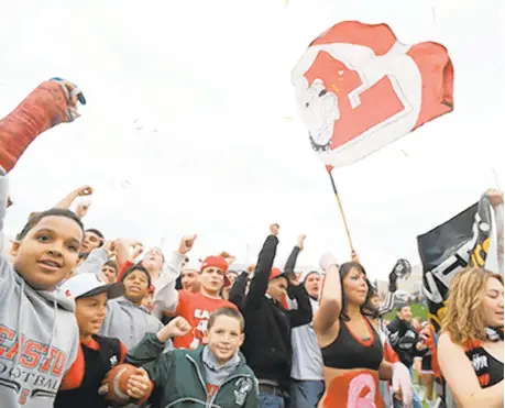  ?? MORNING CALLFILE PHOTO ?? Easton supporters celebrate a victory over Phillipsbu­rg with in a recent Thanksgivi­ng Day football game held at Lafayette’s Fisher Field.