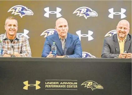  ?? KEVIN RICHARDSON/BALTIMORE SUN PHOTOS ?? Ravens coach John Harbaugh, from left, general manager Eric DeCosta and director of player personnel Joe Hortiz speak to the media after finishing day two of the NFL draft on Friday night.