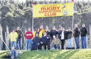  ?? PHOTO: PHIL JANSSEN ?? North Otago Rugby Supporters Club members support the team through thick and thin.