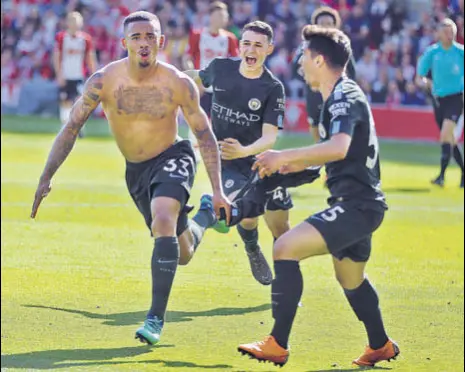  ?? AP PHOTO ?? Gabriel Jesus (left) celebrates after scoring Manchester City’s solitary goal against Southampto­n on Sunday.