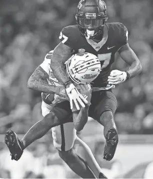  ?? LON HORWEDEL/USA TODAY SPORTS ?? Toledo Rockets cornerback Quinyon Mitchell breaks up a pass intended for Miami receiver Gage Larvadain in the third quarter Dec. 2 at Ford Field in Detroit.