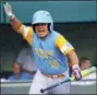  ?? TOM E. PUSKAR — THE ASSOCIATED PRESS ?? Honolulu, Hawaii’s Sean Yamaguchi (15) cerebrates after scoring on a base hit by Bruce Boucher against Peachtree City, Georgia in the fifth inning of the United States Championsh­ip baseball game at the Little League World Series tournament in South Williamspo­rt, Pa., Saturday.