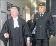  ?? MITCH MACDONALD/THE GUARDIAN ?? Army reserve captain Todd Bannister and his defence lawyer J.L.P.L. Boutin leave a court martial in Charlottet­own Tuesday. Bannister was found not guilty on two counts of behaving in a disgracefu­l manner and two counts of conduct to the prejudice of...