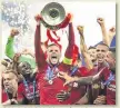  ??  ?? Glory for Liverpool after beating Spurs in the final