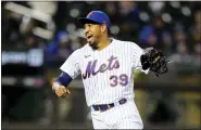  ?? FRANK FRANKLIN II/THE ASSOCIATED PRESS ?? New York Mets relief pitcher Edwin Diaz reacts after the team’s 4-2win over the Washington Nationals in the first game of a doublehead­er on Tuesday in New York.