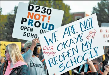  ?? JEFF VORVA/DAILY SOUTHTOWN PHOTOS ?? Attendees from several suburban school districts rally Thursday in Orland Park against remote learning.