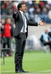  ?? PHOTO: GETTY IMAGES ?? An animated All Whites coach Anthony Hudson on the sideline against Peru.