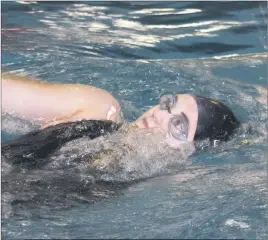  ?? STAFF PHOTO BY MICHAEL REID ?? North Point’s Sydney Marohn-Johnson slices through the water on her way to a fourth-place finish in the 200-yard Individual Medley during Friday’s meet with Northern at Edward T. Hall Aquatic Center in Prince Frederick. Marohn-Johnson and the Eagles...