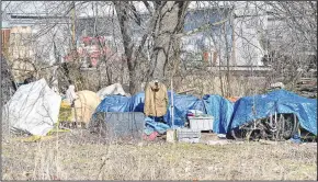  ?? (River Valley Democrat-Gazette/Hank Layton) ?? Tents stand at a homeless encampment Friday near South Sixth Street and South F Street in Fort Smith. Effective today, Fort Smith is banning tents and camping accessorie­s for habitation purposes. Visit nwaonline.com/photo for today’s photo gallery.