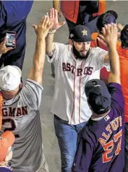  ?? Godofredo A. Vásquez / Staff Photograph­er ?? Astros fans cheer the team’s Game 5 win at Minute Maid Park. The team will open up the ALCS at home on Saturday against the Yankees.