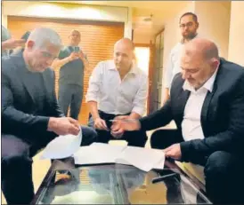  ?? AFP ?? Israeli PM Benjamin Netanyahu (above) attends an event; the troika of Yair Lapid, Naftali Bennett and Mansour Abbas (left to right) sign their historic coalition pact.