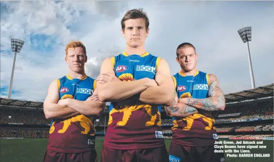  ??  ?? Josh Green, Jed Adcock and Claye Beams have signed new deals with the Lions.
Photo: DARREN ENGLAND