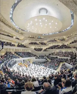  ?? Michael Ukas Pool / Getty Images ?? WORLD LEADERS and others gathered at Hamburg’s spectacula­r new concert hall, the Elbphilhar­monie, to hear a performanc­e of Beethoven’s Symphony No. 9.