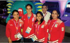  ??  ?? Saina Nehwal along with her father and shooters Apoorvi Chandela, Mehuli Ghosh and Tejasvini Sawant at the Athletes Village.