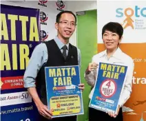  ??  ?? Solid collaborat­ion: Wong (left) and Liow holding uppromotio­nal posters on MATTA Fair after their pressconfe­rence to announce Sota’s participat­ion asMATTA’s technology partner.