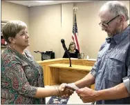  ?? TIMES photograph by Annette Beard ?? Debbie Rambo was sworn into office on the Garfield Planning Commisson by Garfield Mayor Gary Blackburn at the regular City Council meeting Tuesday, Sept. 12.