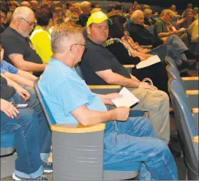  ?? Leslie Hutchison /Hearst Connecticu­t Media ?? Winchester volunteer firefighte­rs attended the town meeting Monday to support the addition of a part-time fire chief in the budget